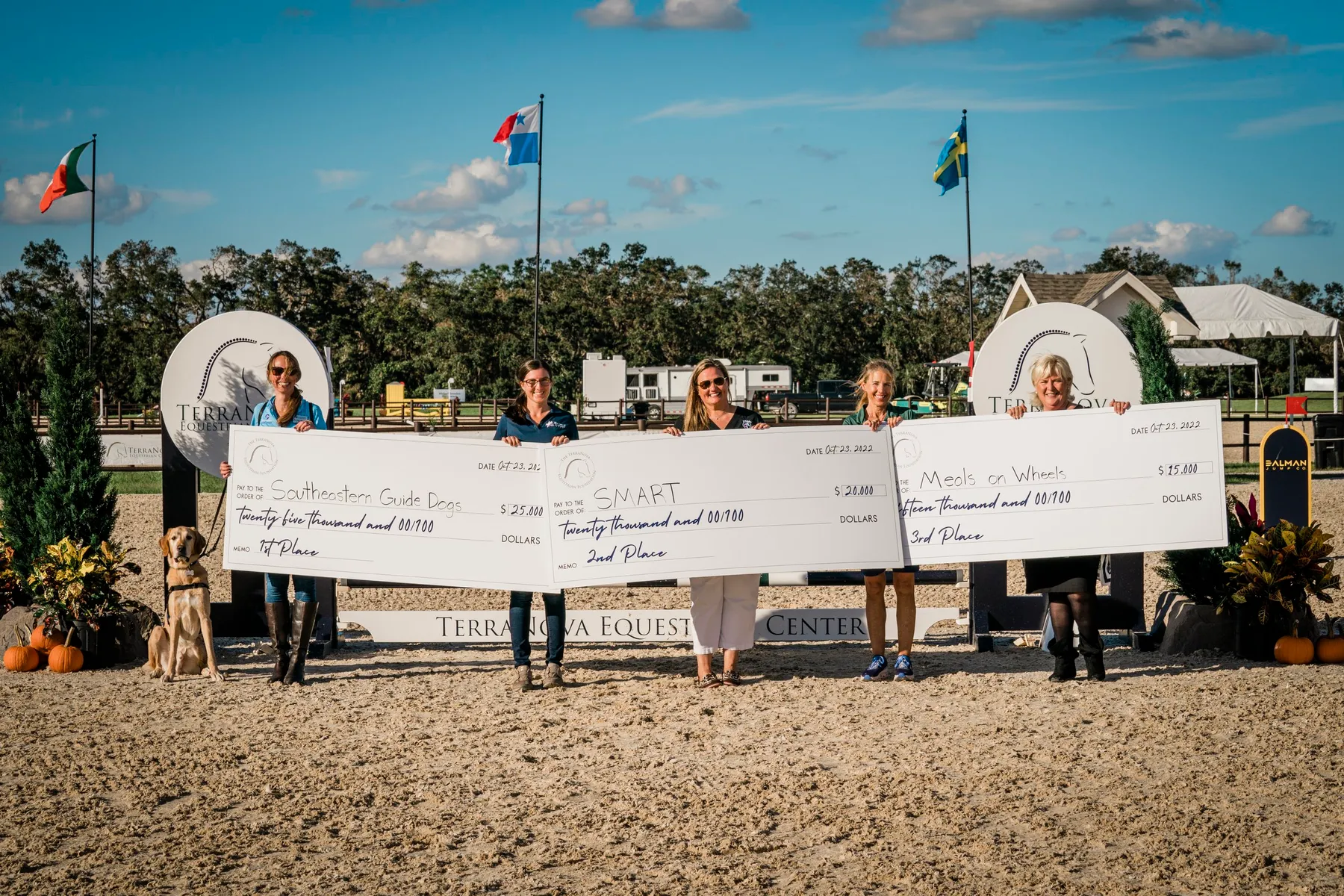 Representatives from Southeastern Guide Dogs, SMART and Meals on Wheels Plus at the WeCareAtTerraNova check presentation